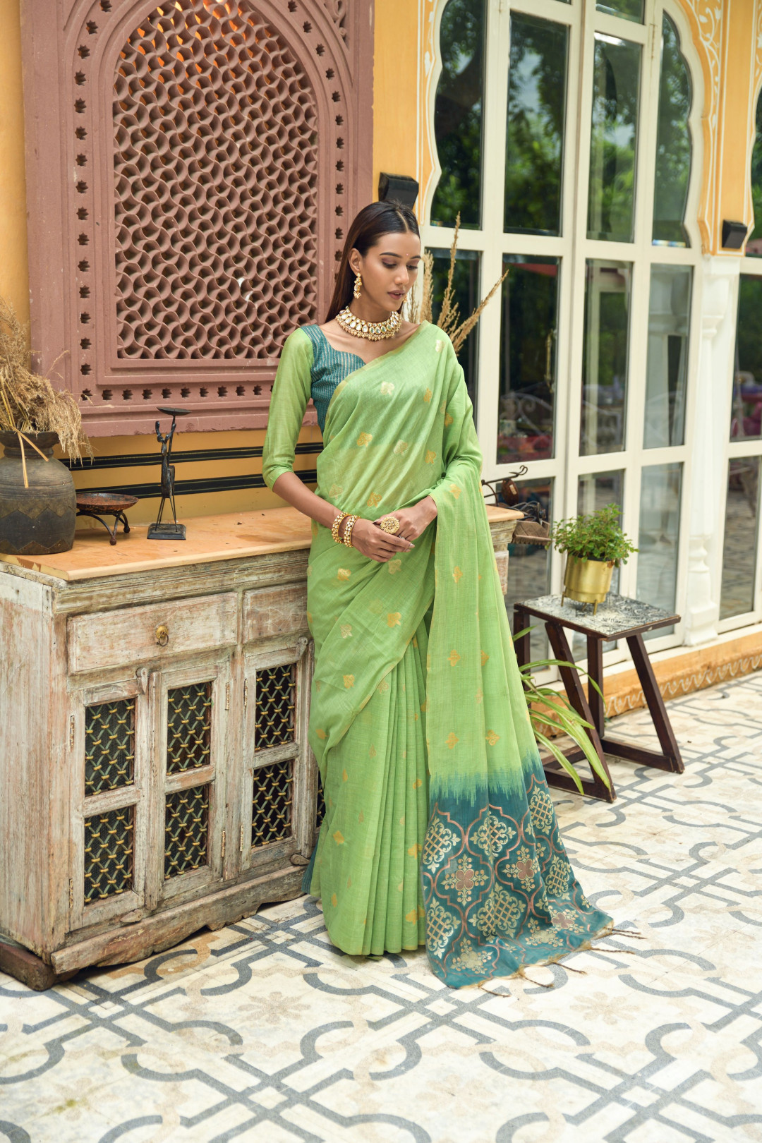 Green Color Linen Silk Saree With Zari Weaving Work