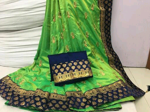 Green color Two Tone Silk Embroidery saree