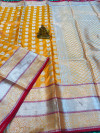 Orange color lichi silk saree with zari weaving work