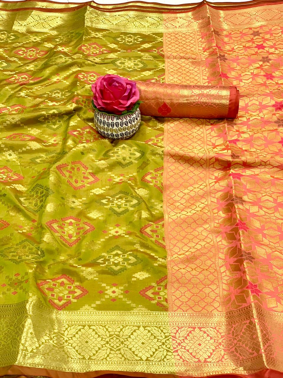 Mahendi Green Color Patola Silk Saree With Zari Weaving Work