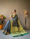 Navy blue color leheriya silk saree with golden zari woven work