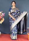 Navy blue color kanchipuram silk saree with golden zari work