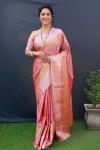 Peach color soft muslin silk saree with woven work