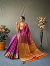 Purple color leheriya silk saree with golden zari woven work
