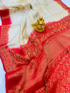 Off white color pure muslin silk saree with golden zari woven work