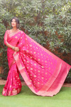 Pink color organza silk saree with golden zari weaving work
