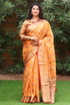 Orange color organza silk saree with zari weaving work