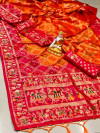 Orange and pink color bandhani printed saree with golden zari weaving work