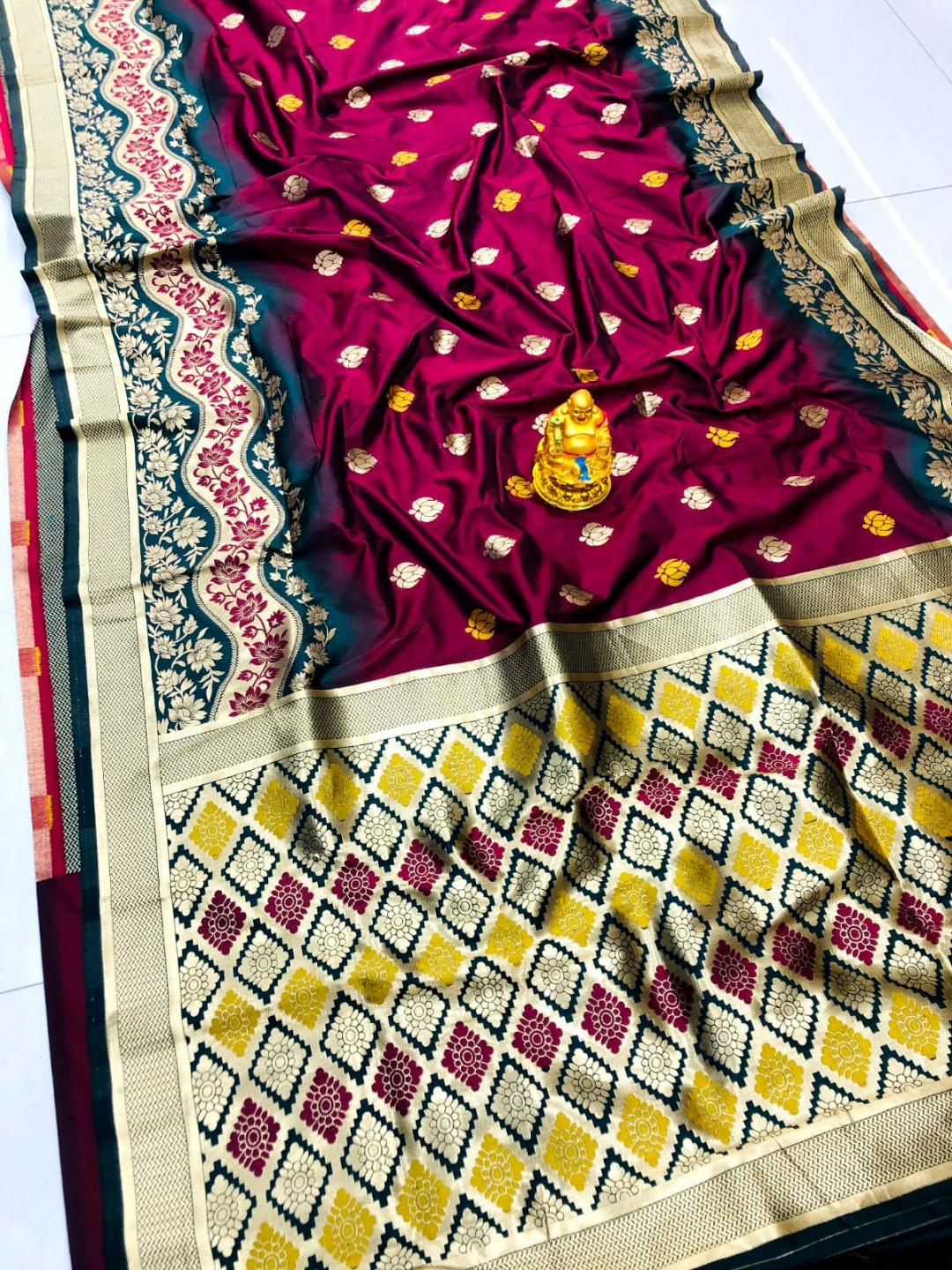 Maroon color paithani silk saree with zari weaving work