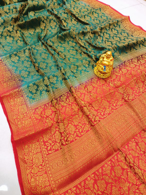 Green color pure muslin silk saree with golden zari woven work