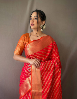 Red color leheriya silk saree with golden zari woven work