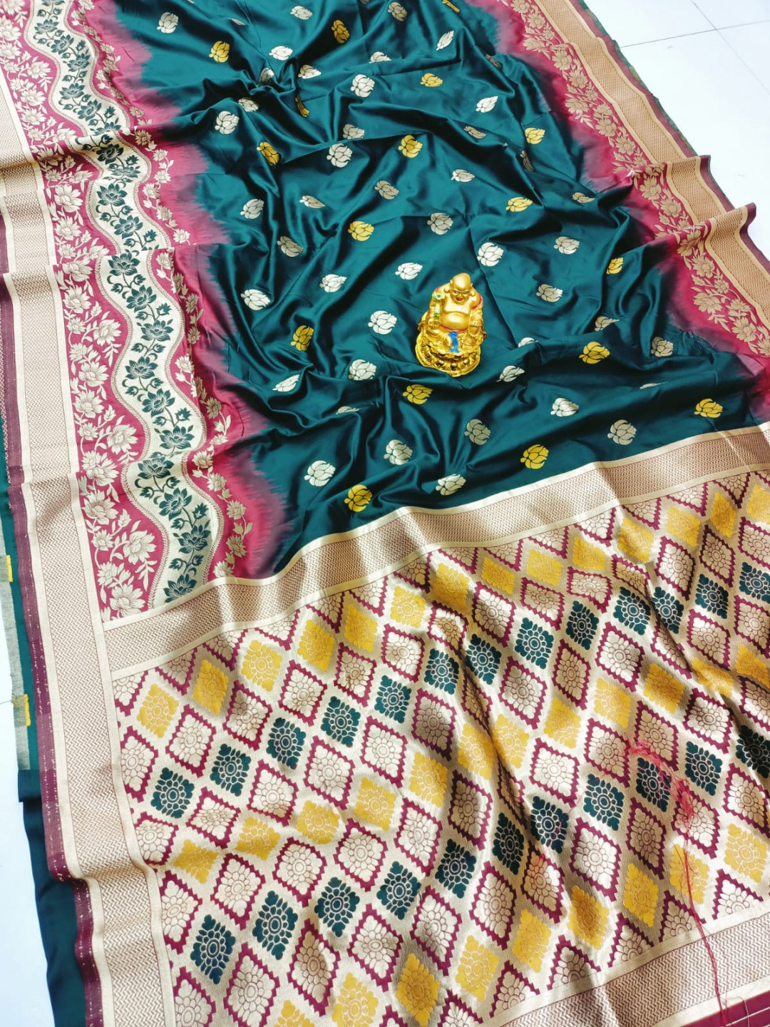 Green color paithani silk saree with zari weaving work
