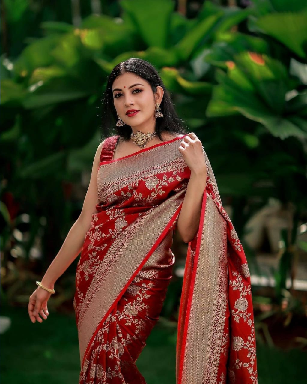 Red color kanchipuram silk saree with zari woven work