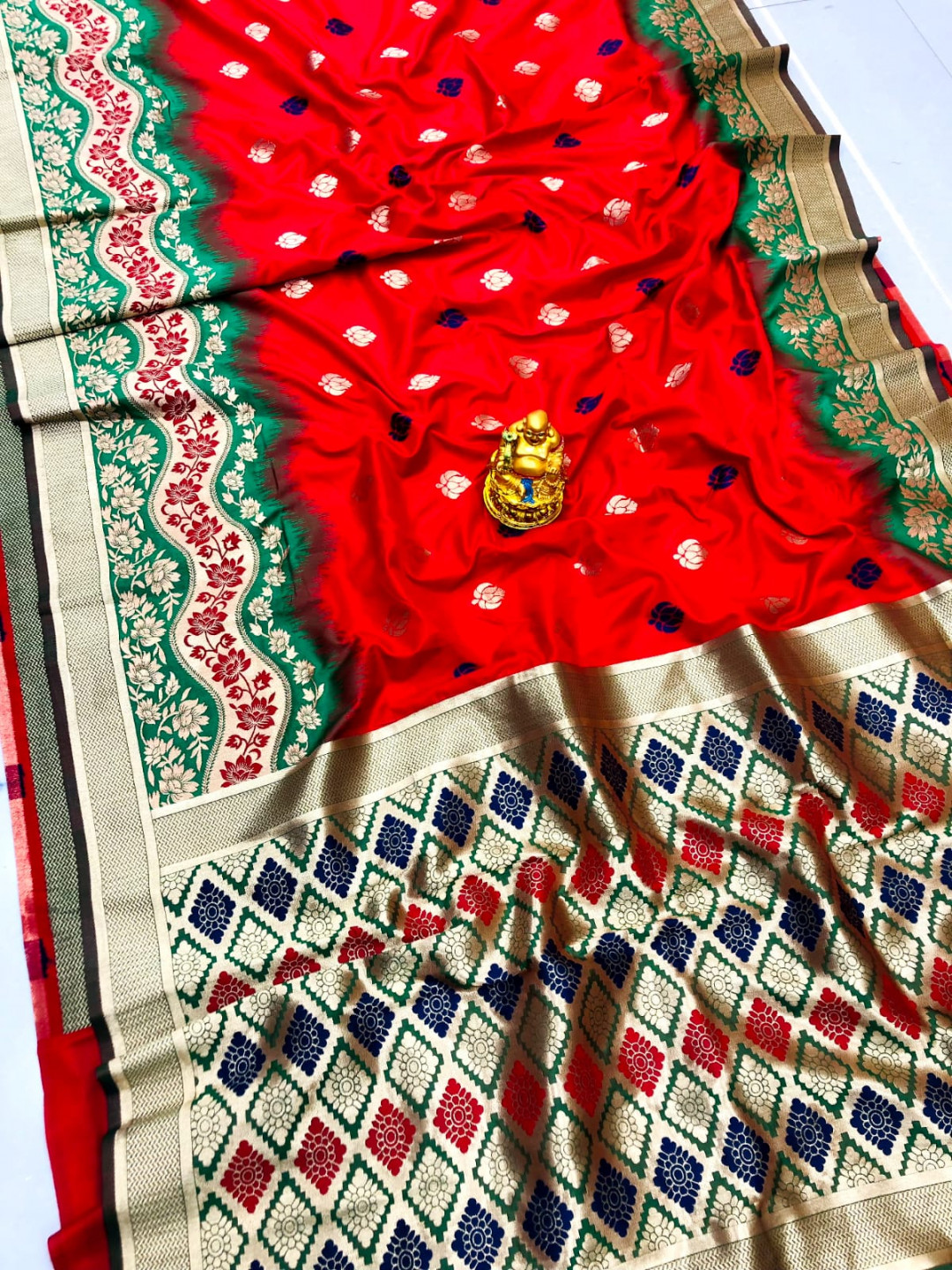 Red color paithani silk saree with zari weaving work