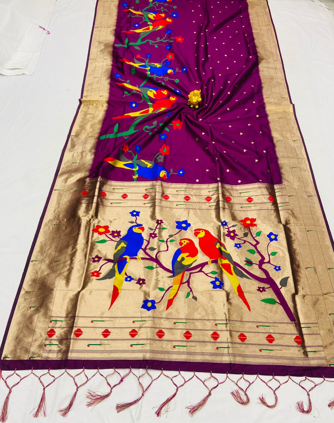 Magenta color paithani silk saree with zari weaving work