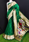 Green color paithani silk saree with zari weaving work