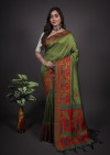 Mehndi green color handloom raw silk saree with zari woven work