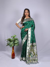 Green color paithani silk saree with zari woven work