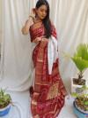 White and red color hand bandhej silk saree with zari weaving work