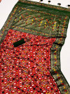 Red color patola silk saree with printed work