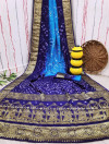 Sky blue and navy blue color bandhej silk saree with zari weaving work