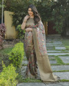 Mahendi green color banarasi silk saree with printed work
