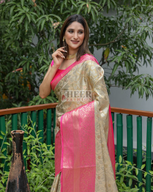Beige color kanchipuram silk saree with zari woven work