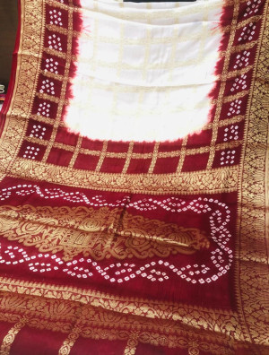 White and red color art silk saree with zari weaving work