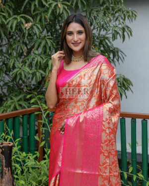 Orange color kanchipuram silk saree with zari woven work