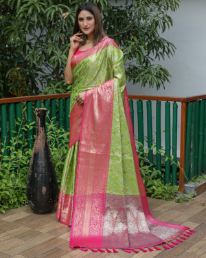 Parrot green color kanchipuram silk saree with zari woven work