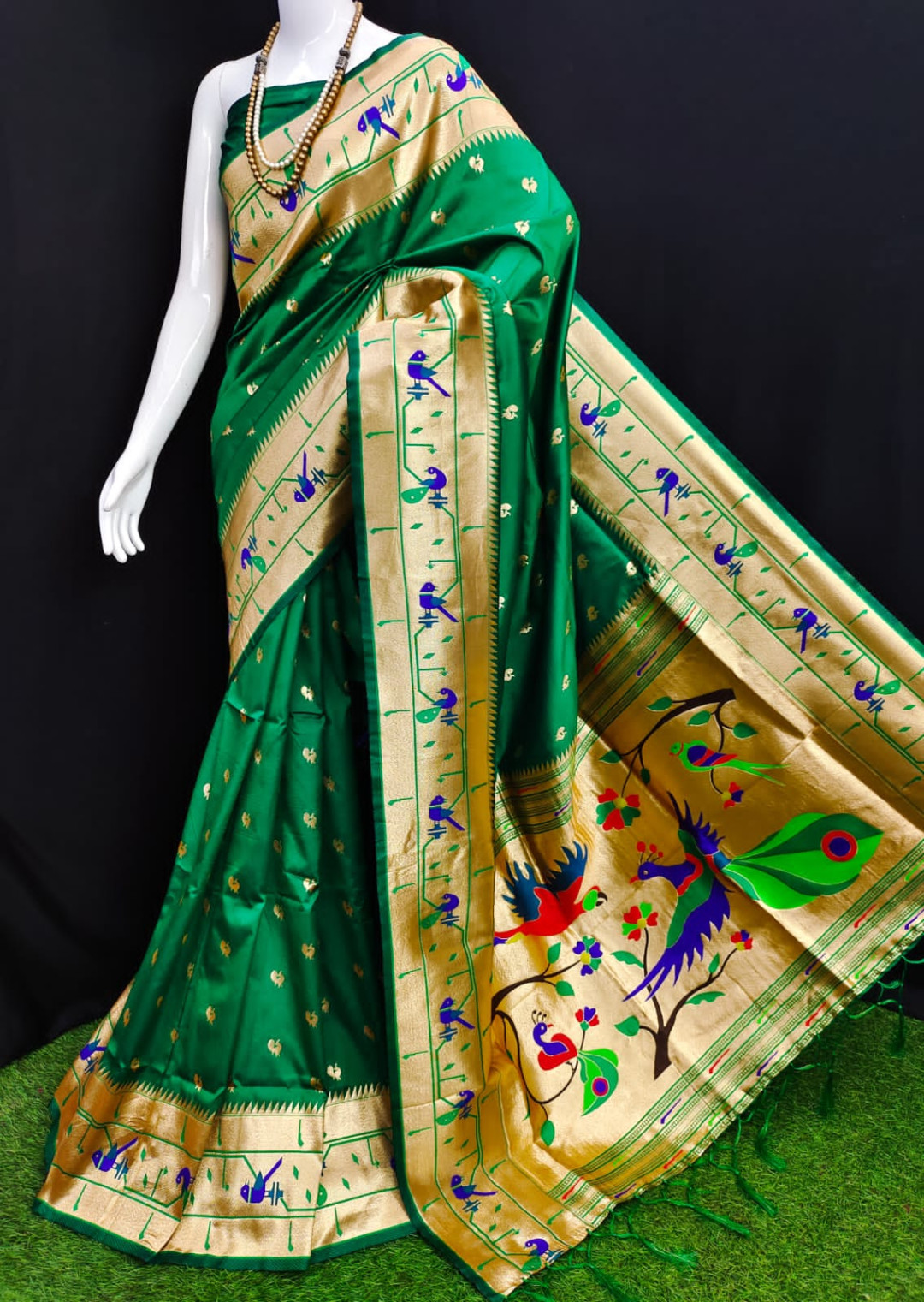 Dark green color paithani silk saree with zari weaving work