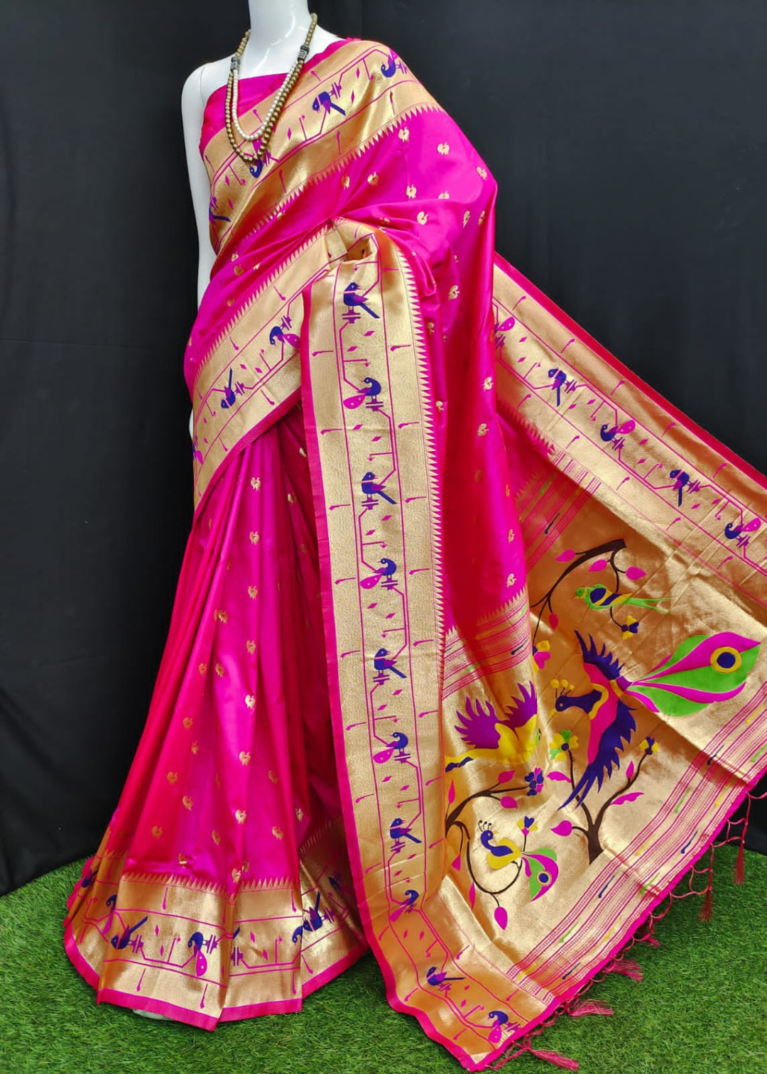 Rani pink color paithani silk saree with zari weaving work