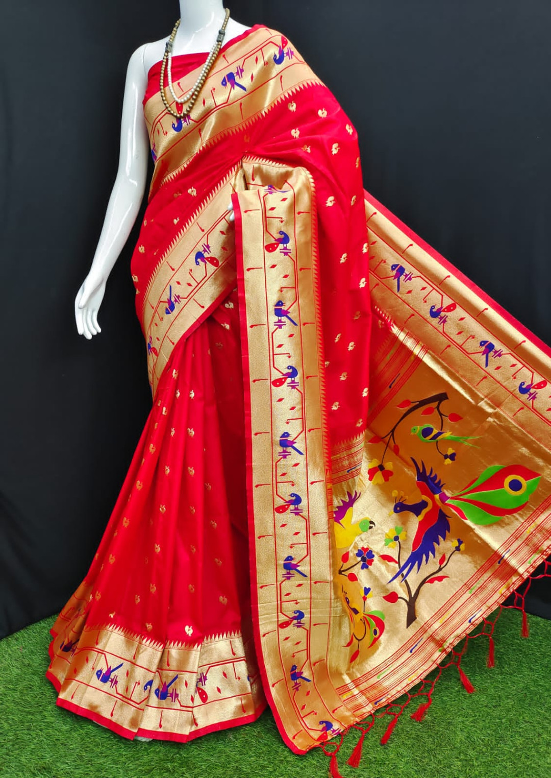 Red color paithani silk saree with zari weaving work