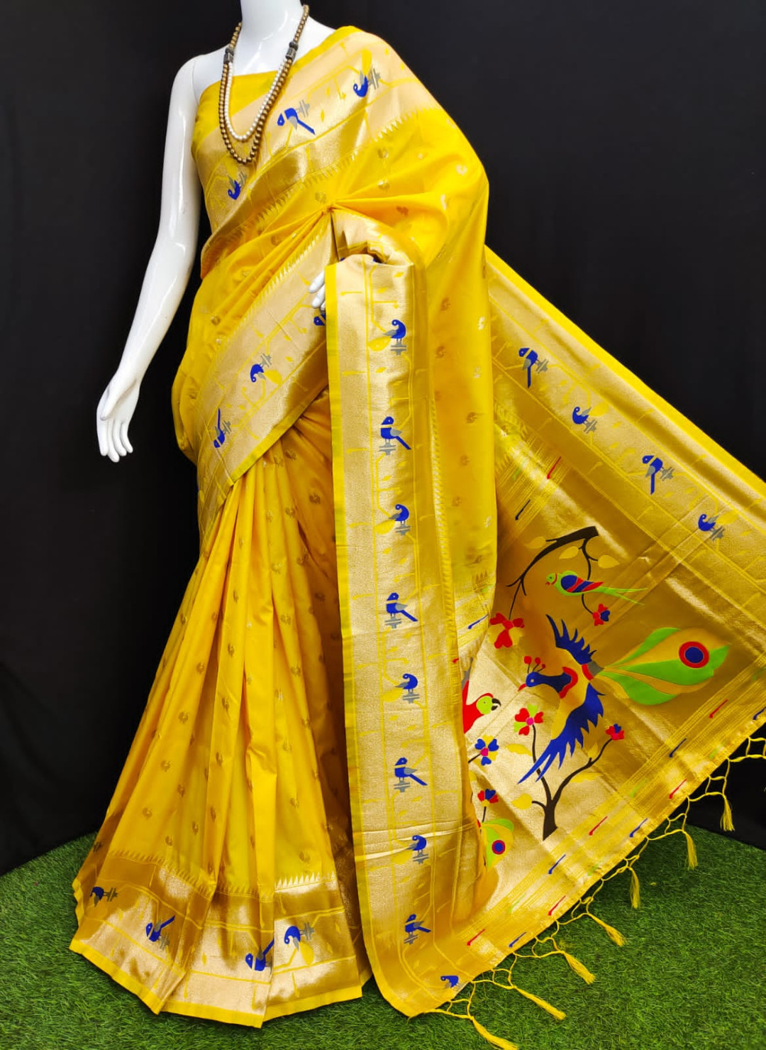 Yellow color paithani silk saree with zari weaving work
