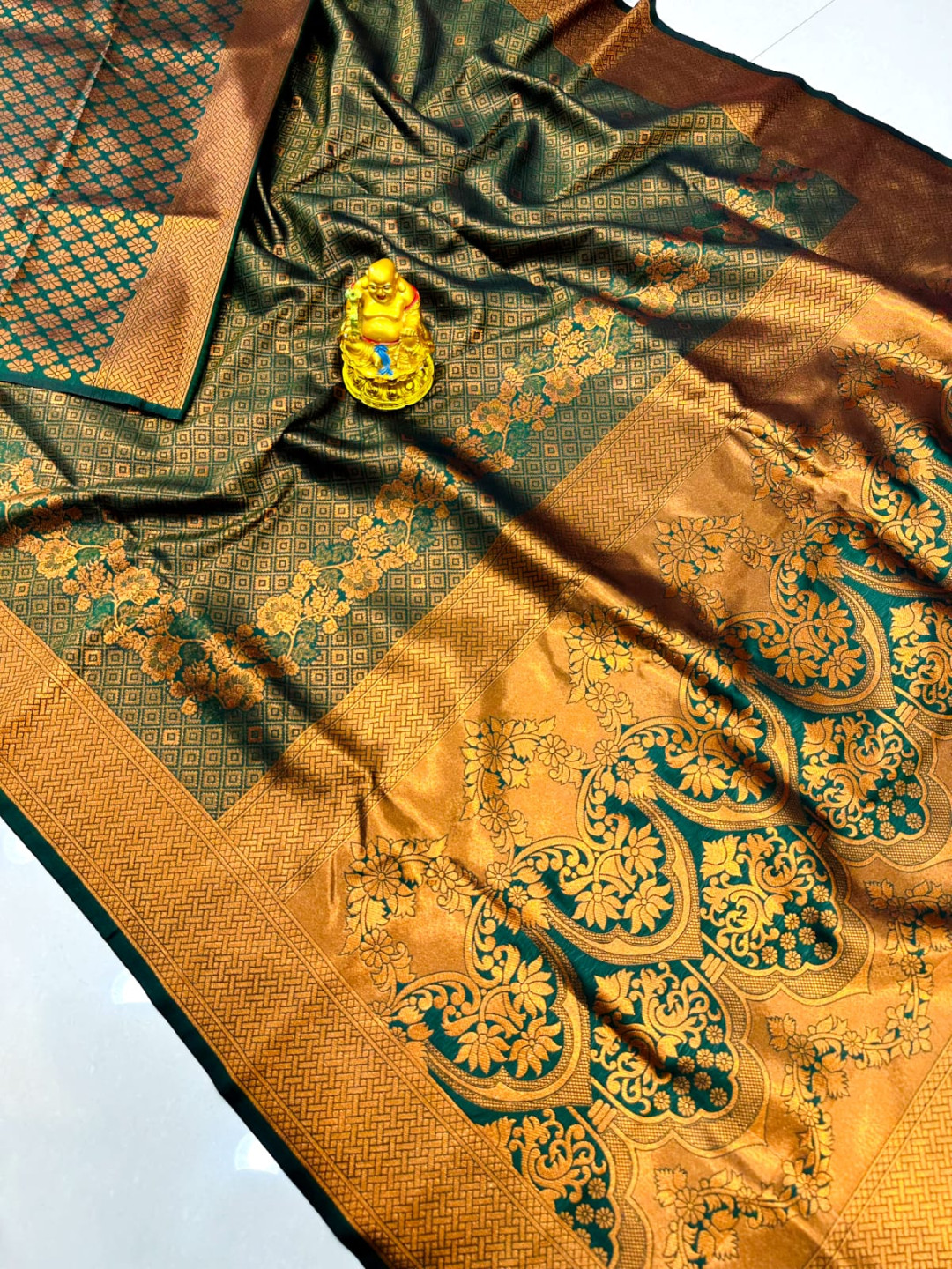 Rama green color banarasi silk saree with zari weaving work
