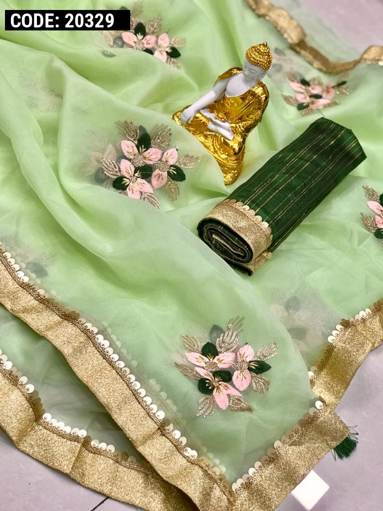 Pista green color organza silk saree with embroidery work