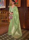 Pista green color banarasi silk saree with zari weaving work