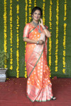 Orange color soft lichi silk saree with silver zari weaving work