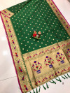 Green color paithani silk saree with golden zari weaving work