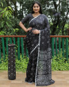 Black color bandhej silk saree with printed work