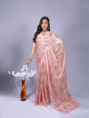 Peach color soft georgette saree with zari weaving work