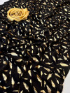 Black color pure satin silk saree with foil printed work