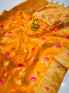Orange color soft organza silk saree with woven design