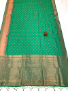 Sea green color soft banarasi silk saree with zari weaving work