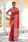 Red color tassar silk saree with zari woven work