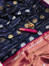Navy blue color soft banarasi lichi silk saree with golden and silver zari work