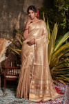 Beige color metallic linen saree with zari work