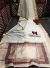 White color pure linen saree with colorful temple woven zari border