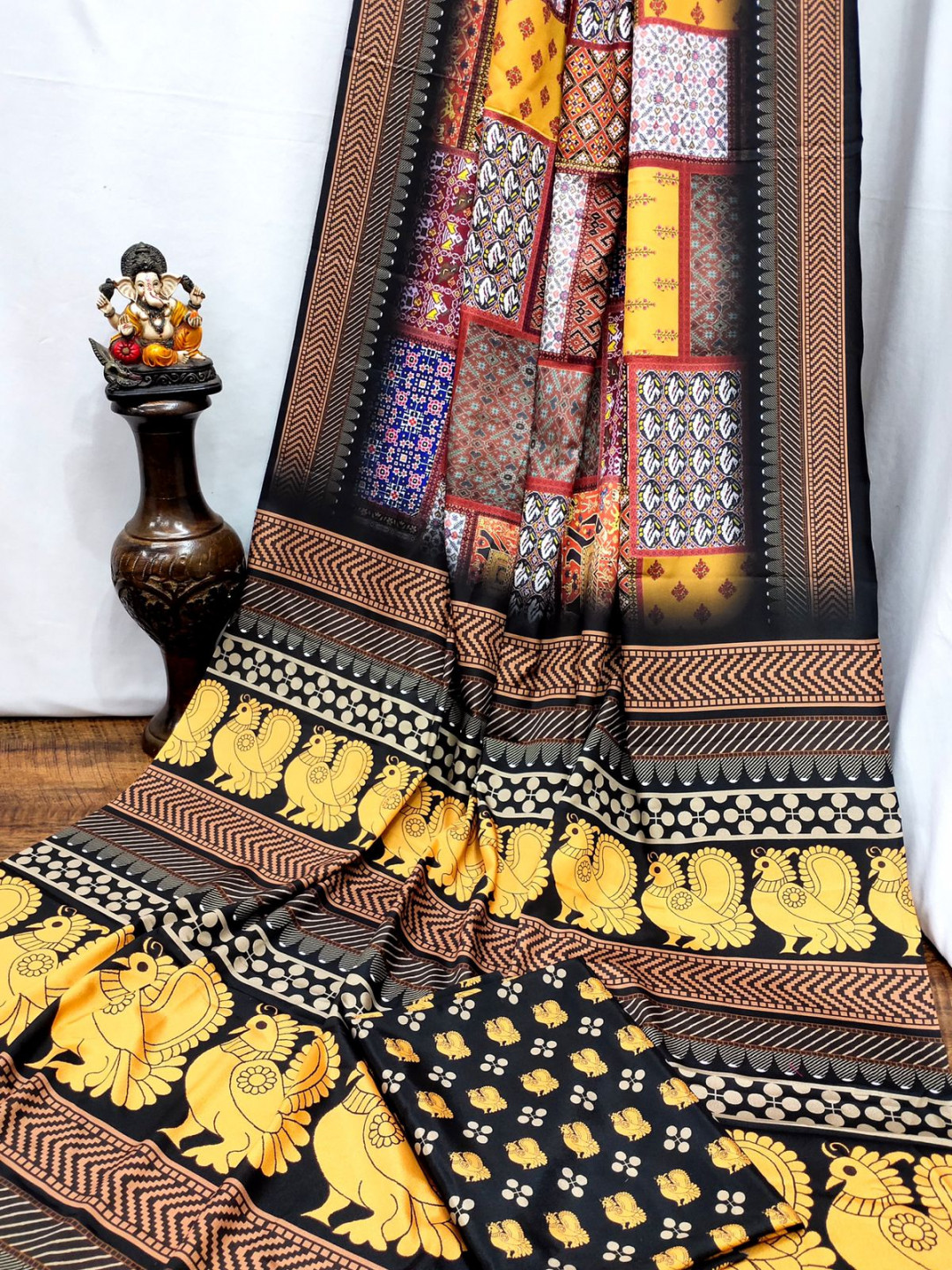 Multi color crape silk saree with kalamkari bandhej print