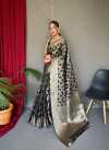 Black color linen silk saree with zari weaving work